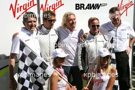 28.03.2009 Melbourne, Australia,  Sir Richard Branson (GBR) CEO of the Virgin Group makes and announcement regarding the Virgin sponsorship deal with Brawn GP, Nick Fry (GBR), Brawn GP, Chief Executive Officer, Jenson Button (GBR), Brawn GP, Sir Richard Branson (GBR), Virgin Group CEO, Rubens Barrichello (BRA), Brawn GP and Ross Brawn (GBR) Team Principal, Brawn GP  - Formula 1 World Championship, Rd 1, Australian Grand Prix, Saturday