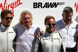 28.03.2009 Melbourne, Australia,  Sir Richard Branson (GBR) CEO of the Virgin Group makes and announcement regarding the Virgin sponsorship deal with Brawn GP. Jenson Button (GBR), Brawn GP , Sir Richard Branson (GBR), Virgin Group CEO, Rubens Barrichello (BRA), Brawn GP and Ross Brawn (GBR) Team Principal, Brawn GP  - Formula 1 World Championship, Rd 1, Australian Grand Prix, Saturday