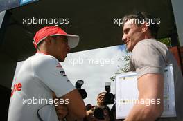 26.03.2009 Melbourne, Australia,  Lewis Hamilton (GBR), McLaren Mercedes and David Coulthard (GBR) Red Bull Racing Advisor, BBC Television Pundit - Formula 1 World Championship, Rd 1, Australian Grand Prix, Thursday