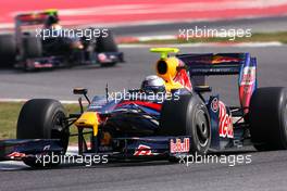 12.03.2009 Barcelona, Spain,  Sebastian Vettel (GER), Red Bull Racing, RB5 and Sebastien Buemi (SUI), Scuderia Toro Rosso, STR4, STR04, STR-04  - Formula 1 Testing, Barcelona