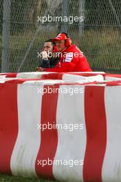 11.03.2009 Barcelona, Spain,  Michael Schumacher (GER), Test Driver, Scuderia Ferrari and Nicolas Todt (FRA), Manager of Felipe Massa - Formula 1 Testing, Barcelona