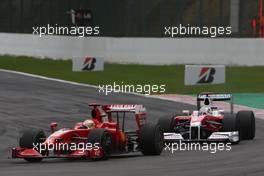 30.08.2009 Francorchamps, Belgium,  Luca Badoer (ITA), Scuderia Ferrari, F60 and Jarno Trulli (ITA), Toyota Racing, TF109 - Formula 1 World Championship, Rd 12, Belgian Grand Prix, Sunday Race