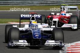 30.08.2009 Francorchamps, Belgium,  Nico Rosberg (GER), WilliamsF1 Team, Timo Glock (GER), Toyota F1 Team - Formula 1 World Championship, Rd 12, Belgian Grand Prix, Sunday Race