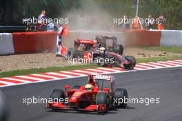 Lewis Hamilton (GBR), McLaren Mercedes and Jaime Alguersuari (ESP), Scuderia Toro Rosso crashes in the first lap - Formula 1 World Championship, Rd 12, Belgian Grand Prix, Sunday Race