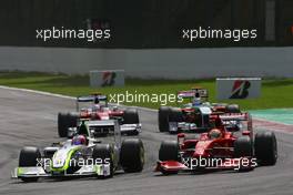 30.08.2009 Francorchamps, Belgium,  Rubens Barrichello (BRA), BrawnGP, BGP001 and Luca Badoer (ITA), Scuderia Ferrari, F60 - Formula 1 World Championship, Rd 12, Belgian Grand Prix, Sunday Race