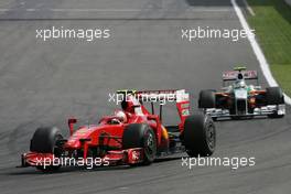 30.08.2009 Francorchamps, Belgium,  Kimi Raikkonen (FIN), Räikkönen, Scuderia Ferrari anf Giancarlo Fisichella (ITA), Force India F1 Team  - Formula 1 World Championship, Rd 12, Belgian Grand Prix, Sunday Race