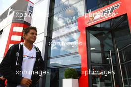30.08.2009 Francorchamps, Belgium,  Giancarlo Fisichella (ITA), Force India F1 Team walks past the Ferrari Motorhome - Formula 1 World Championship, Rd 12, Belgian Grand Prix, Sunday