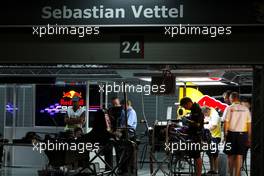 24.04.2009 Manama, Bahrain,  The pitlane at night, the garage of Sebastian Vettel (GER), Red Bull Racing - Formula 1 World Championship, Rd 4, Bahrain Grand Prix, Friday