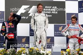 26.04.2009 Manama, Bahrain,  Sebastian Vettel (GER), Red Bull Racing, Jenson Button (GBR), Brawn GP, Jarno Trulli (ITA), Toyota Racing  - Formula 1 World Championship, Rd 4, Bahrain Grand Prix, Sunday Podium