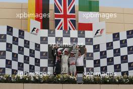 26.04.2009 Manama, Bahrain,  Sebastian Vettel (GER), Red Bull Racing, Jenson Button (GBR), Brawn GP, Jarno Trulli (ITA), Toyota Racing  - Formula 1 World Championship, Rd 4, Bahrain Grand Prix, Sunday Podium