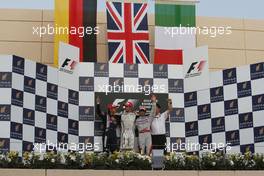 26.04.2009 Manama, Bahrain,  Sebastian Vettel (GER), Red Bull Racing, Jenson Button (GBR), Brawn GP, Jarno Trulli (ITA), Toyota Racing  - Formula 1 World Championship, Rd 4, Bahrain Grand Prix, Sunday Podium