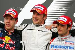 26.04.2009 Manama, Bahrain,  Sebastian Vettel (GER), Red Bull Racing, Jenson Button (GBR), Brawn GP and Jarno Trulli (ITA), Toyota F1 Team  - Formula 1 World Championship, Rd 4, Bahrain Grand Prix, Sunday Podium