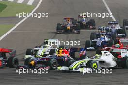 26.04.2009 Manama, Bahrain,  Start, Sebastian Vettel (GER), Red Bull Racing, RB5 and Jenson Button (GBR), Brawn GP, BGP001, BGP 001 - Formula 1 World Championship, Rd 4, Bahrain Grand Prix, Sunday Race