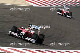 26.04.2009 Manama, Bahrain,  Timo Glock (GER), Toyota F1 Team, TF109 leads Jarno Trulli (ITA), Toyota Racing, TF109 - Formula 1 World Championship, Rd 4, Bahrain Grand Prix, Sunday Race