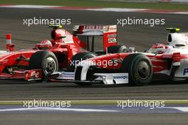 26.04.2009 Manama, Bahrain,  Kimi Raikkonen (FIN), Räikkönen, Scuderia Ferrari and Timo Glock (GER), Toyota F1 Team  - Formula 1 World Championship, Rd 4, Bahrain Grand Prix, Sunday Race