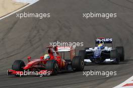 26.04.2009 Manama, Bahrain,  Felipe Massa (BRA), Scuderia Ferrari, F60 and Nico Rosberg (GER), Williams F1 Team, FW31 - Formula 1 World Championship, Rd 4, Bahrain Grand Prix, Sunday Race