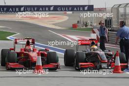 25.04.2009 Manama, Bahrain,  Kimi Raikkonen (FIN), Räikkönen, Scuderia Ferrari and Lewis Hamilton (GBR), McLaren Mercedes - Formula 1 World Championship, Rd 4, Bahrain Grand Prix, Saturday Qualifying