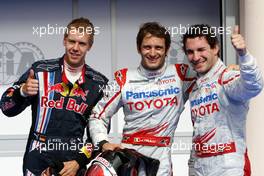 25.04.2009 Manama, Bahrain,  Sebastian Vettel (GER), Red Bull Racing, Jarno Trulli (ITA), Toyota F1 Team and Timo Glock (GER), Toyota F1 Team - Formula 1 World Championship, Rd 4, Bahrain Grand Prix, Saturday Qualifying