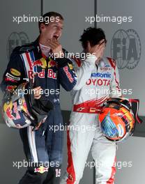 25.04.2009 Manama, Bahrain,  Sebastian Vettel (GER), Red Bull Racing and Timo Glock (GER), Toyota F1 Team - Formula 1 World Championship, Rd 4, Bahrain Grand Prix, Saturday Qualifying
