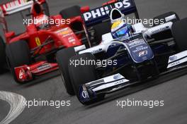 16.10.2009 Sao Paulo, Brazil,  Nico Rosberg (GER), Williams F1 Team and Kimi Raikkonen (FIN), Räikkönen, Scuderia Ferrari  - Formula 1 World Championship, Rd 16, Brazilian Grand Prix, Friday Practice