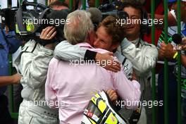 18.10.2009 Sao Paulo, Brazil,  Jenson Button (GBR), Brawn GP and his father John - Formula 1 World Championship, Rd 16, Brazilian Grand Prix, Sunday Podium