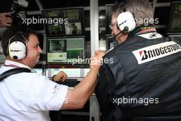 18.10.2009 Sao Paulo, Brazil,  Ron Meddows and Ross Brawn Celebrate winning the world championship - Formula 1 World Championship, Rd 16, Brazilian Grand Prix, Sunday Podium
