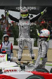 18.10.2009 Sao Paulo, Brazil,  Jenson Button (GBR), BrawnGP wins the world championshipwith Rubens Barrichello (BRA), BrawnGP  - Formula 1 World Championship, Rd 16, Brazilian Grand Prix, Sunday Podium