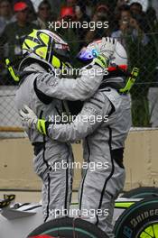 18.10.2009 Sao Paulo, Brazil,  Jenson Button (GBR), BrawnGP wins the world championship and Rubens Barrichello (BRA), BrawnGP  - Formula 1 World Championship, Rd 16, Brazilian Grand Prix, Sunday Podium