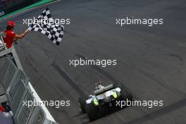 18.10.2009 Sao Paulo, Brazil,  Felipe Massa (BRA), Scuderia Ferrari flags Jenson Button (GBR), Brawn GP  - Formula 1 World Championship, Rd 16, Brazilian Grand Prix, Sunday Podium
