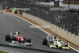 18.10.2009 Sao Paulo, Brazil,  Kamui Kobayashi (JAP), Toyota F1 Team and Jenson Button (GBR), Brawn GP  - Formula 1 World Championship, Rd 16, Brazilian Grand Prix, Sunday Race