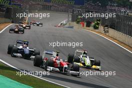 18.10.2009 Sao Paulo, Brazil,  Kamui Kobayashi (JAP), Toyota F1 Team and Jenson Button (GBR), Brawn GP  - Formula 1 World Championship, Rd 16, Brazilian Grand Prix, Sunday Race