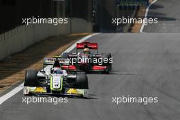 18.10.2009 Sao Paulo, Brazil,  Rubens Barrichello (BRA), Brawn GP and Lewis Hamilton (GBR), McLaren Mercedes  - Formula 1 World Championship, Rd 16, Brazilian Grand Prix, Sunday Race