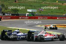 18.10.2009 Sao Paulo, Brazil,  Kazuki Nakajima (JPN), Williams F1 Team and Kamui Kobayashi (JAP), Toyota F1 Team  - Formula 1 World Championship, Rd 16, Brazilian Grand Prix, Sunday Race