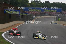 18.10.2009 Sao Paulo, Brazil,  Lewis Hamilton (GBR), McLaren Mercedes and Rubens Barrichello (BRA), Brawn GP  - Formula 1 World Championship, Rd 16, Brazilian Grand Prix, Sunday Race