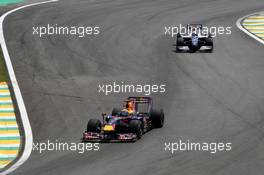 18.10.2009 Sao Paulo, Brazil,  Mark Webber (AUS), Red Bull Racing leads Nico Rosberg (GER), WilliamsF1 Team - Formula 1 World Championship, Rd 16, Brazilian Grand Prix, Sunday Race