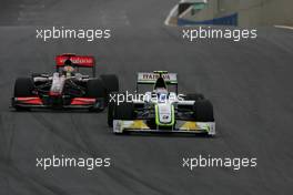 18.10.2009 Sao Paulo, Brazil,  Rubens Barrichello (BRA), Brawn GP and Lewis Hamilton (GBR), McLaren Mercedes  - Formula 1 World Championship, Rd 16, Brazilian Grand Prix, Sunday Race