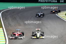 18.10.2009 Sao Paulo, Brazil,  Kamui Kobayashi, Test Driver, Toyota F1 Team, Jenson Button (GBR), BrawnGP - Formula 1 World Championship, Rd 16, Brazilian Grand Prix, Sunday Race