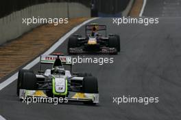 18.10.2009 Sao Paulo, Brazil,  Jenson Button (GBR), Brawn GP and Sebastian Vettel (GER), Red Bull Racing  - Formula 1 World Championship, Rd 16, Brazilian Grand Prix, Sunday Race