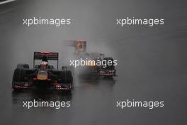 17.10.2009 Sao Paulo, Brazil,  Jaime Alguersuari (ESP), Scuderia Toro Rosso and Mark Webber (AUS), Red Bull Racing  - Formula 1 World Championship, Rd 16, Brazilian Grand Prix, Saturday Qualifying