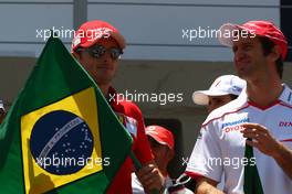 18.10.2009 Sao Paulo, Brazil,  Giancarlo Fisichella (ITA), Scuderia Ferrari and Jarno Trulli (ITA), Toyota Racing - Formula 1 World Championship, Rd 16, Brazilian Grand Prix, Sunday