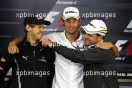 15.10.2009 Sao Paulo, Brazil,  Sebastian Vettel (GER), Red Bull Racing, Jenson Button (GBR), BrawnGP, Rubens Barrichello (BRA), BrawnGP - Formula 1 World Championship, Rd 16, Brazilian Grand Prix, Thursday Press Conference