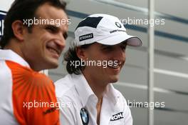 15.10.2009 Sao Paulo, Brazil,  Vitantonio Liuzzi (ITA), Force India F1 Team and Robert Kubica (POL), BMW Sauber F1 Team  - Formula 1 World Championship, Rd 16, Brazilian Grand Prix, Thursday