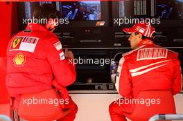 17.04.2009 Shanghai, China, Rob Smedly, (GBR), Scuderia Ferrari, Track Engineer of Felipe Massa (BRA) and Felipe Massa (BRA), Scuderia Ferrari, Pitlane, Box, Garage - Formula 1 World Championship, Rd 3, Chinese Grand Prix, Friday Practice