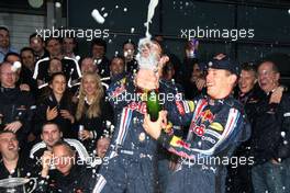 19.04.2009 Shanghai, China,  Mark Webber (AUS), Red Bull Racing, Christian Horner (GBR), Red Bull Racing, Sporting Director, Sebastian Vettel (GER), Red Bull Racing celebrate first and second with the team - Formula 1 World Championship, Rd 3, Chinese Grand Prix, Sunday Podium