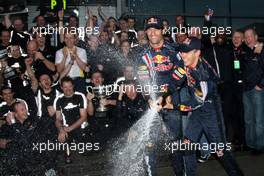 19.04.2009 Shanghai, China,  Mark Webber (AUS), Red Bull Racing, Christian Horner (GBR), Red Bull Racing, Sporting Director, Sebastian Vettel (GER), Red Bull Racing celebrate first and second with the team - Formula 1 World Championship, Rd 3, Chinese Grand Prix, Sunday Podium