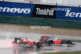 19.04.2009 Shanghai, China,  Lewis Hamilton (GBR), McLaren Mercedes, MP4-24 leads Kimi Raikkonen (FIN), Räikkönen, Scuderia Ferrari, F60 - Formula 1 World Championship, Rd 3, Chinese Grand Prix, Sunday Race