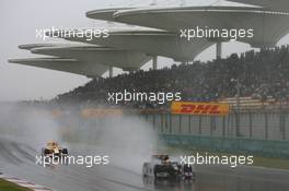19.04.2009 Shanghai, China,  Sébastien Buemi (SUI), Scuderia Toro Rosso, STR4, STR04, STAR-04 and Fernando Alonso (ESP), Renault F1 Team, R29 - Formula 1 World Championship, Rd 3, Chinese Grand Prix, Sunday Race