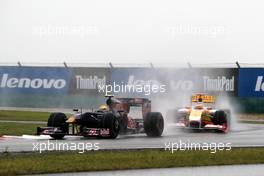 19.04.2009 Shanghai, China,  Sébastien Buemi (SUI), Scuderia Toro Rosso leads Fernando Alonso (ESP), Renault F1 Team, R29 - Formula 1 World Championship, Rd 3, Chinese Grand Prix, Sunday Race