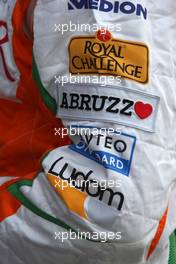 18.04.2009 Shanghai, China,  ABRUZZ support for the Italian earthquake victims on the arm of Giancarlo Fisichella (ITA), Force India F1 Team  - Formula 1 World Championship, Rd 3, Chinese Grand Prix, Saturday