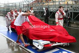 19.04.2009 Shanghai, China,  A Toyota with a rain cover - Formula 1 World Championship, Rd 3, Chinese Grand Prix, Sunday